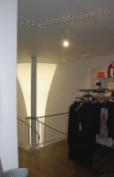 Eckleuchte Modehaus Iller, Murten 